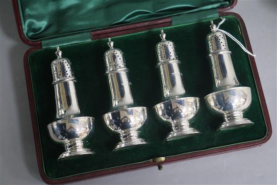 A cased set of four Edwardian silver pepperettes by James Dixon & Sons, Sheffield, 1901, 5 oz.